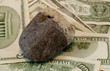 stone on dollars