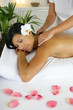 Woman having exotic back massage