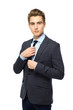 Businessman adjusting his tie
