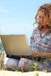 Woman working on the beach