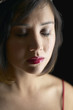 Close up of Asian woman crying