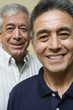 Close up portrait of two elderly men