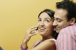 Smiling couple with mobile phone