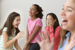 Four girls laughing