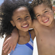Portrait of girl and boy smiling