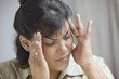 Close up of woman with headache