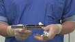 Video: Surgeon preparing a disposable linear cutter stapler Surgeon preparing a disposable linear cutter stapler
