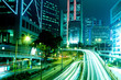 moving car with blur light through city at night