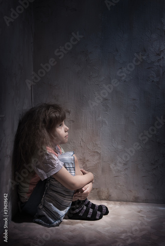 Photo: child in a dark corner child in a dark corner