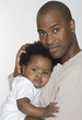 Father holding his baby daughter