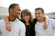 Young woman hanging out with a couple of guys
