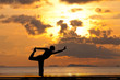 Man silhouette doing yoga exercise natarja