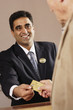 Businessman accepting credit card payment