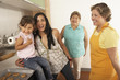 Female members of a family cooking together