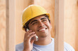 Close up of construction worker talking on cell phone