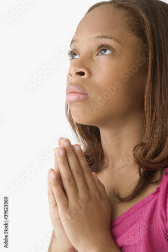 Photo: Young girl praying Young girl praying