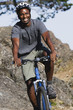 Male cyclist in rugged terrain