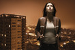 Woman overlooking urban area