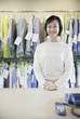 Happy Asian drycleaner