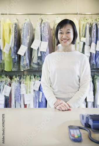 Photo: Happy Asian drycleaner Happy Asian drycleaner