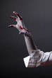 Creepy zombie hand, extreme body-art