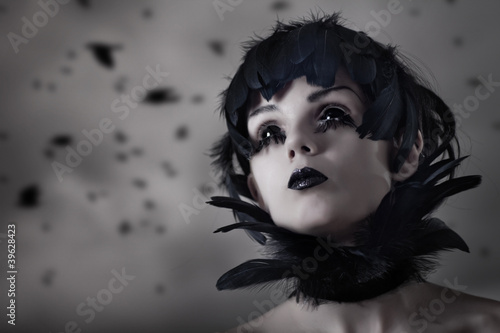 Photo: Crow girl with feather wig and black eyes Crow girl with feather wig and black eyes