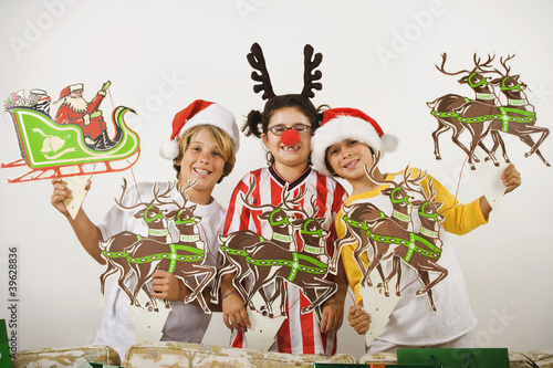 Photo: Group of children with Christmas decorations Group of children with Christmas decorations