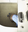 Businessman crawling under his desk