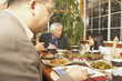 Asian family eating at the dinner table