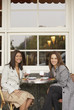 Two women having coffee at a cafe