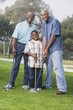 African American family playing golf
