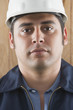 Close up of Hispanic man wearing hard hat