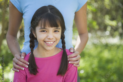 Photo: Hispanic girl smiling outdoors Hispanic girl smiling outdoors