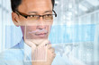 Businessman studying digital business and financial