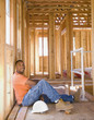 African male construction worker inside construction site