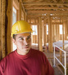 Hispanic male construction worker inside construction site