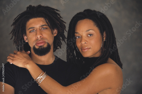 Photo: Portrait of African couple hugging Portrait of African couple hugging