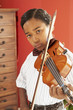 African boy playing violin
