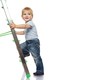 Foto: Cute little boy climbing on a ladder. Cute little boy climbing on a ladder.