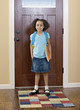 African girl leaving for school