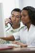 Two businesspeople working at desk