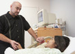 Hispanic man visiting girlfriend in hospital
