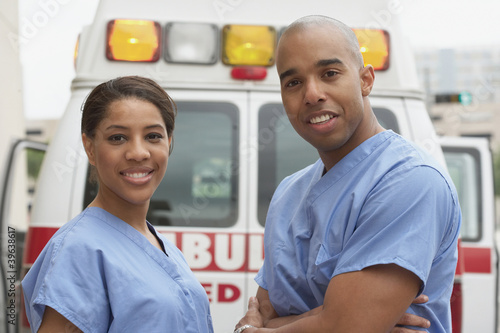 Photo: African nurses next to ambulance African nurses next to ambulance