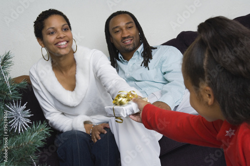 Photo: African family exchanging gifts at Christmas African family exchanging gifts at Christmas