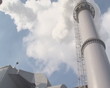 Smoking fumes boiler stack chimney. Warm-town technology winter