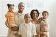 Portrait of African family indoors