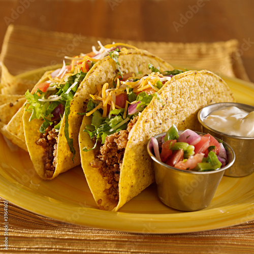 Photo: Tacos on a platter with tortillas - mexican food Tacos on a platter with tortillas - mexican food
