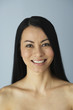 Portrait of Asian woman with bare shoulders