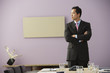 Asian businessman with arms crossed
