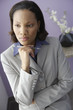 African businesswoman thinking